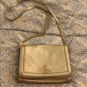Gold Tory Burch crossbody purse